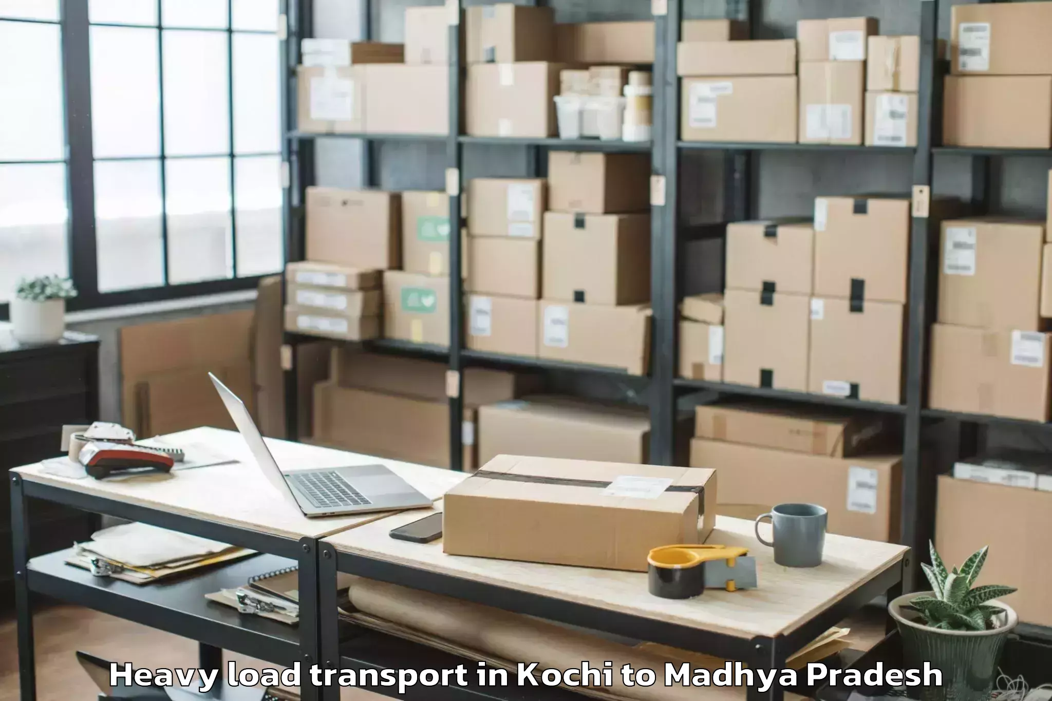 Top Kochi to Indore Airport Idr Heavy Load Transport Available